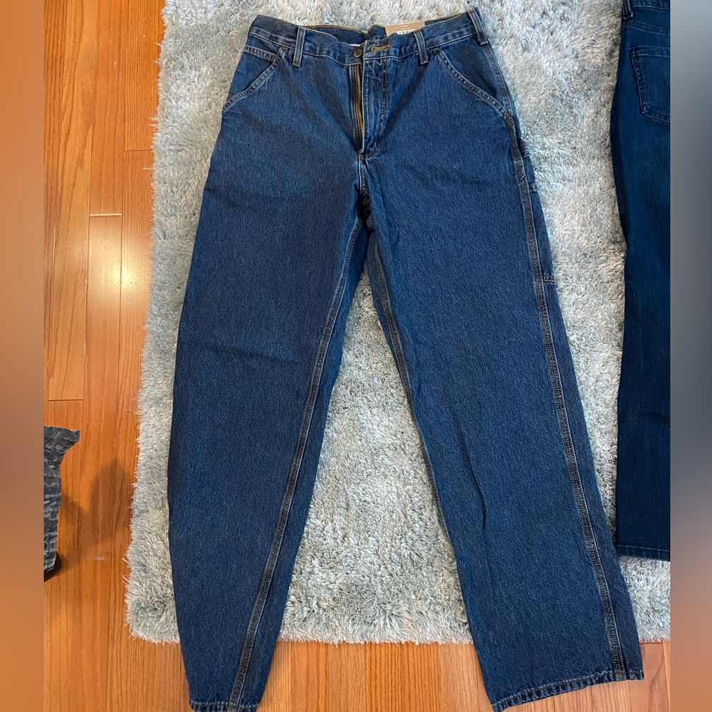 Carhartt jeans 33x34. Loose original fit. New with tags still attached.